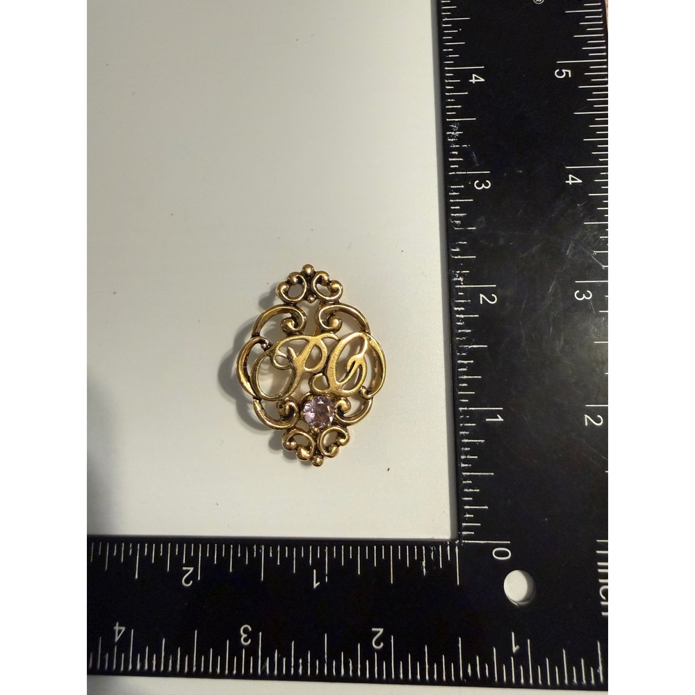 Vintage Gold Tone Monogram Brooch Purple Rhinestone Filigree Scrolled Pin